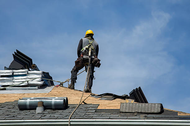Professional Roofing technician working in Ute, IA